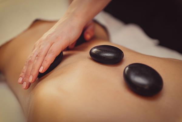  Benefits Of A Hot Stone Massage